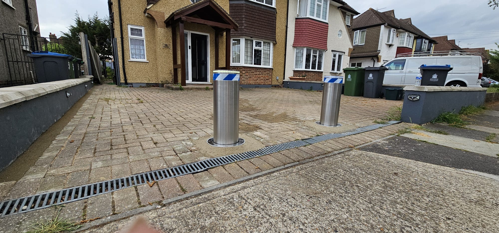 KJS Bollards protecting a residential driveway entrance