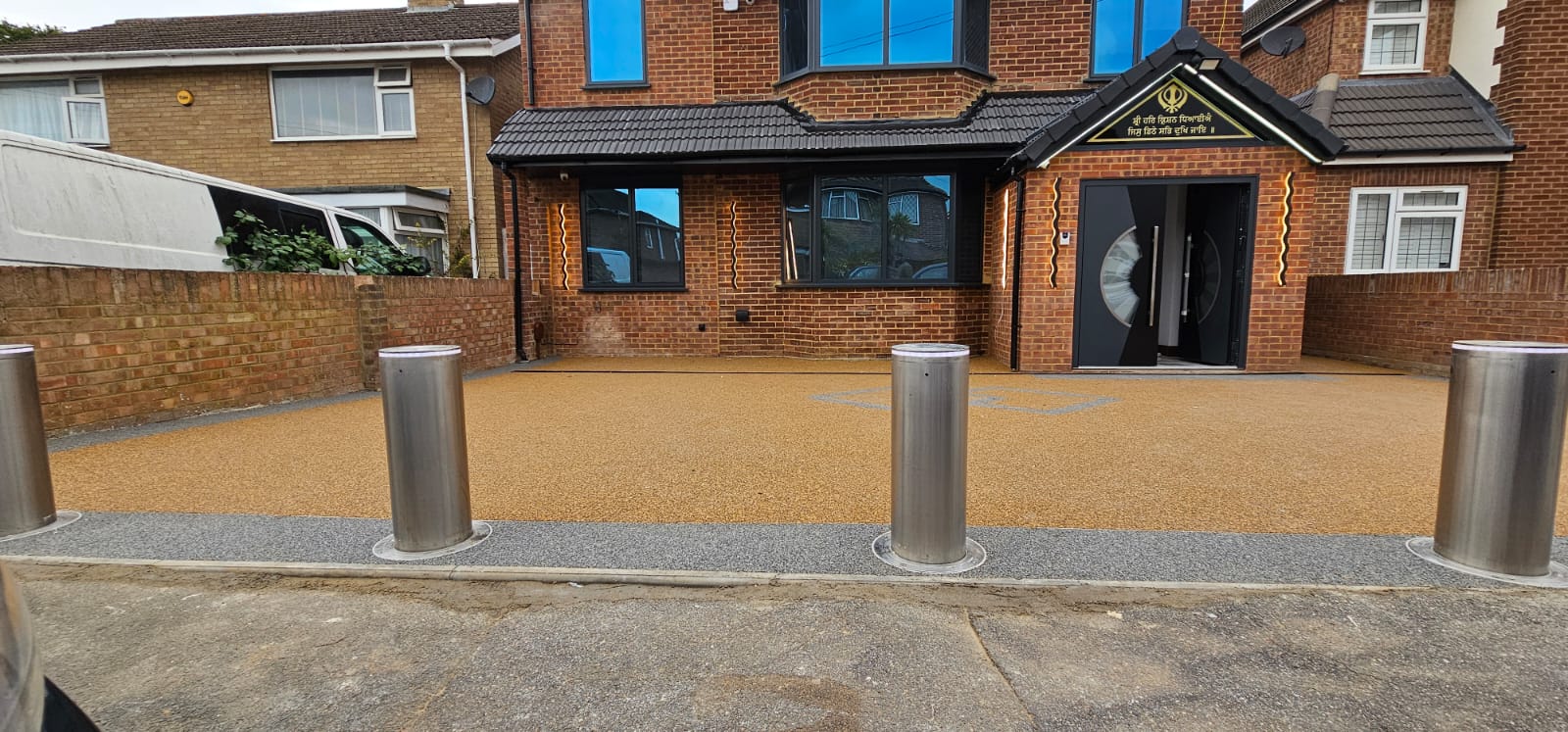 KJS Bollards protecting a wide residential entrance